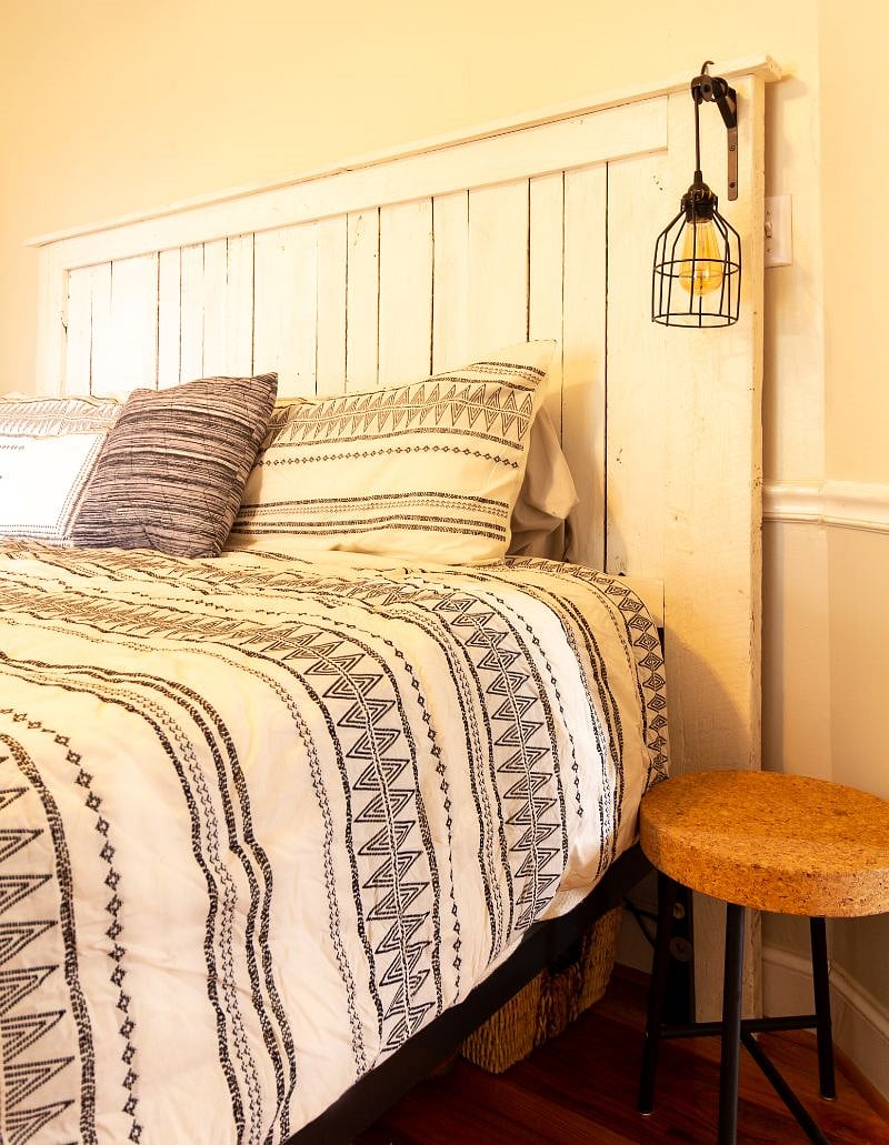 Master bed headboard is handmade by Calvin