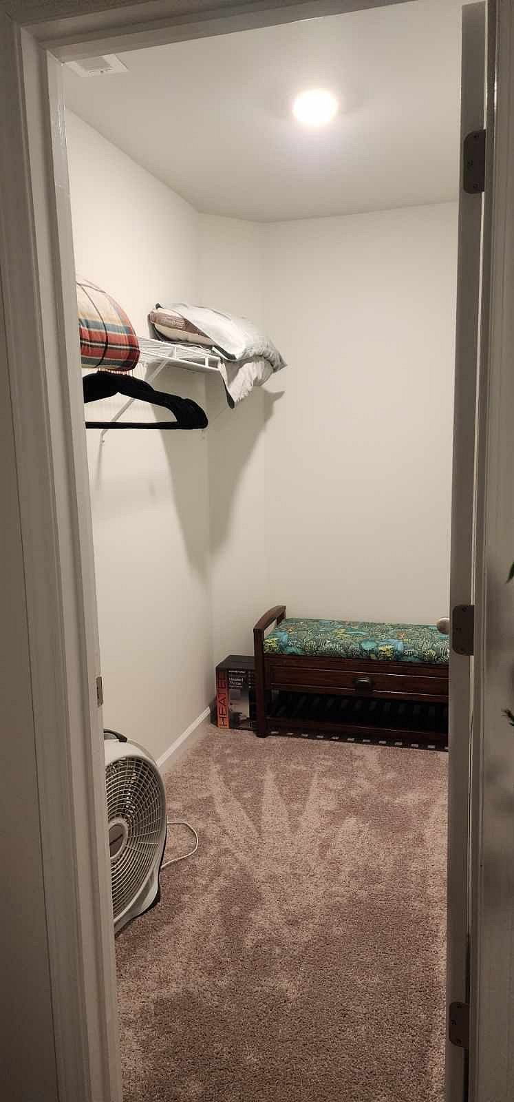 Private Master Suite Walk-In Closet with Bench