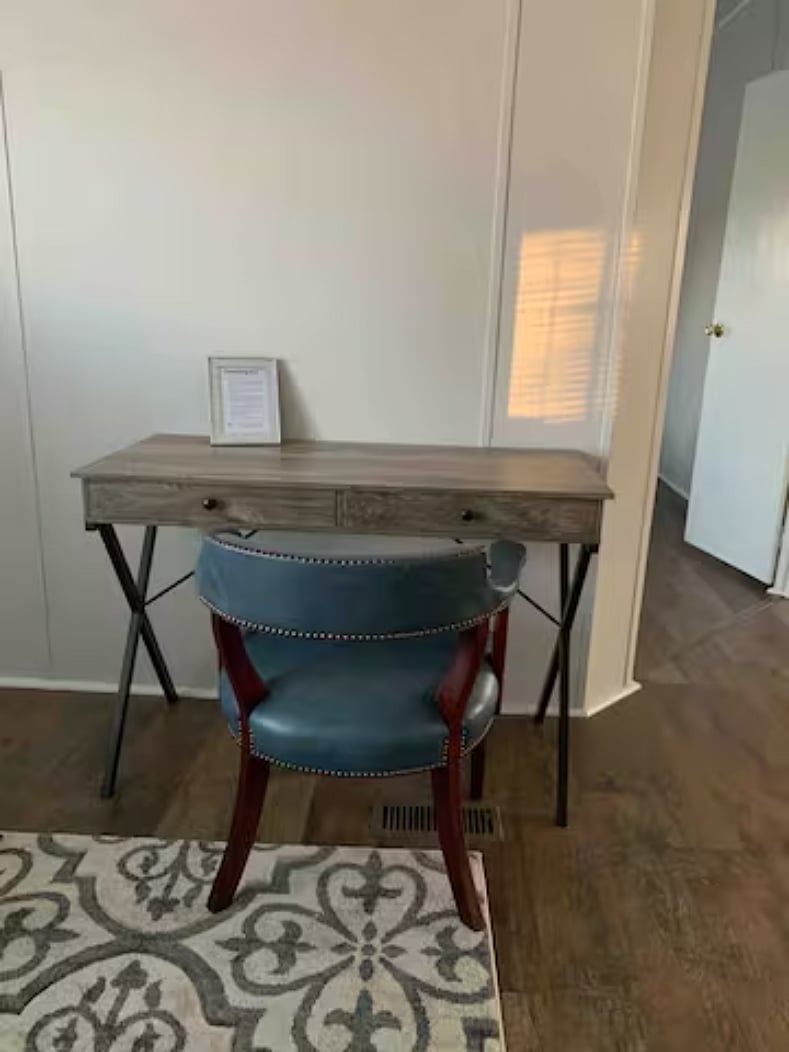 Desk and desk chair in front room