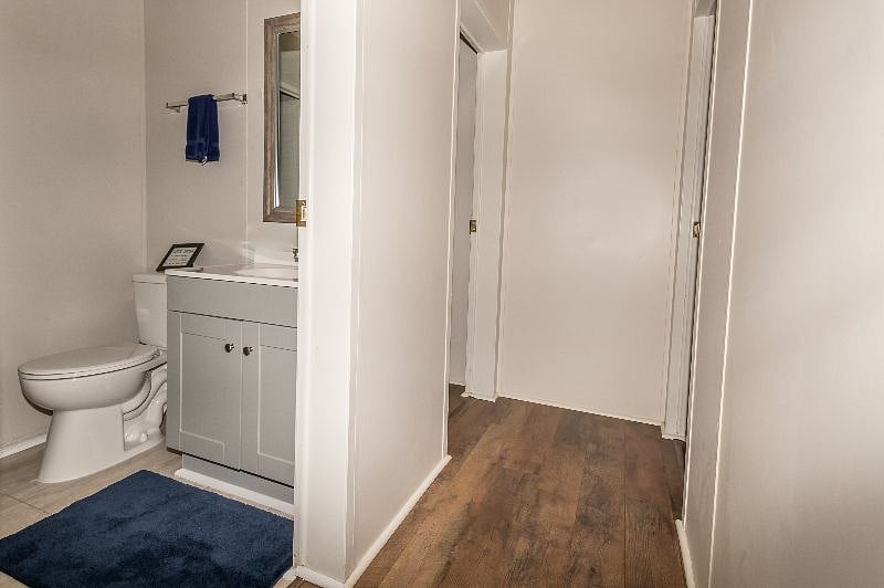 Hallway, hallway bathroom, and entry to bedroom 2 and 3