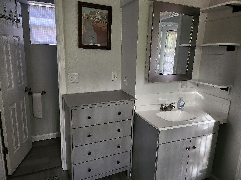 South bedroom area with vanity in room