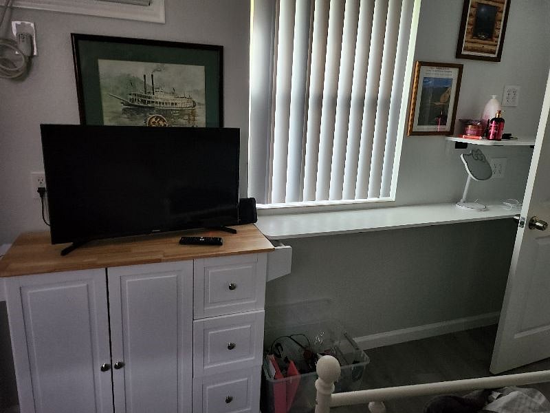 North bedroom area with rolling fold up top