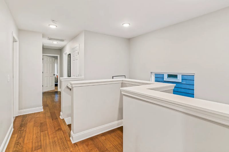 Upstairs Hallway. Second floor of home consists of Master bedroom with full bathroom, 2 Guest bedrooms with closets, a full bathroom, laundry, and an office with walk in closet.  