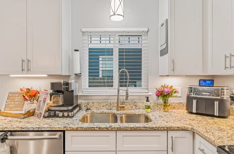 Kitchen equipped with fridge, stove, dishwasher, microwave, high end appliances such as Ninja Air fryer, Ninja Blender, Keurig Coffee Pot/Cup Maker, Spices and anything else you may need to make yourself at home. 