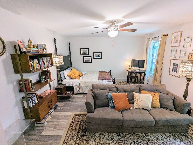 The primary bedroom is enormous and feels almost like a studio apartment. It has an en-suit bathroom with a double vanity and an equally-large walk-in closet. Each bedroom is equipped with blackout curtains.