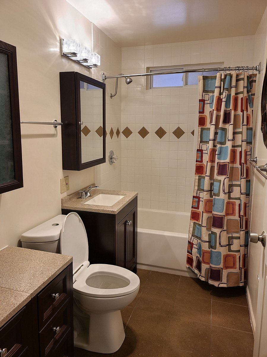 Shared bath with tub/shower.