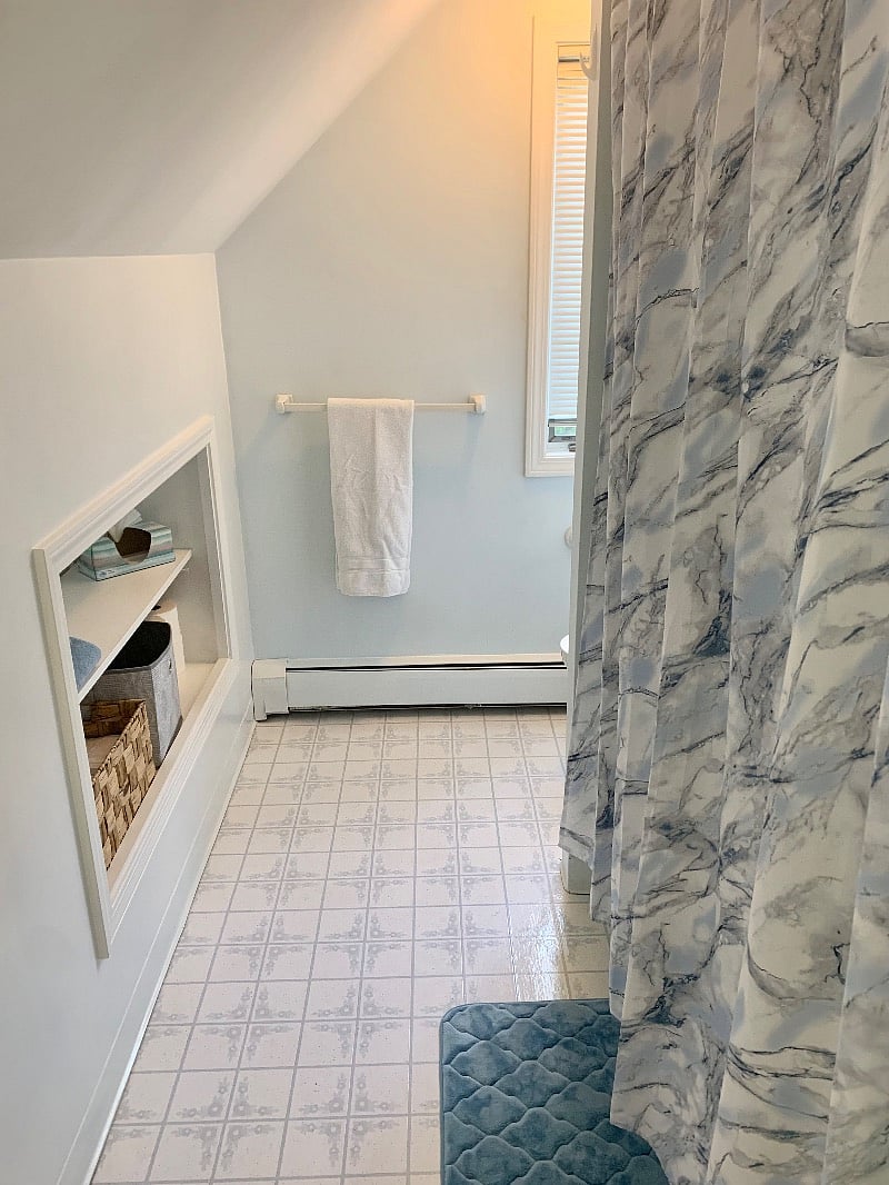 Full tub and shower in bathroom with GREAT water pressure