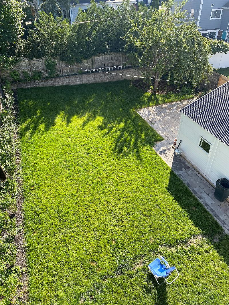 There are front and back porches, with back porch overlooking an expansive backyard. You can enjoy the view from the porch with a morning cup of coffee or tea or an evening after work drinks or dinner.