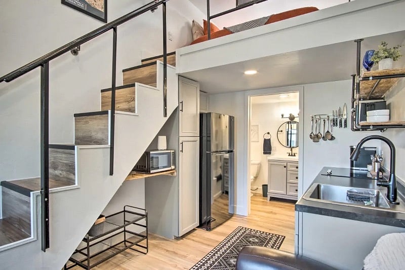 Full size galley style kitchen offers a refrigerator and freezer along with a pantry for ample storage. Standard cutlery and dinnerware sets are provided. Cooking pots/pans and standard kitchen supplies (ie spices) are provided. 