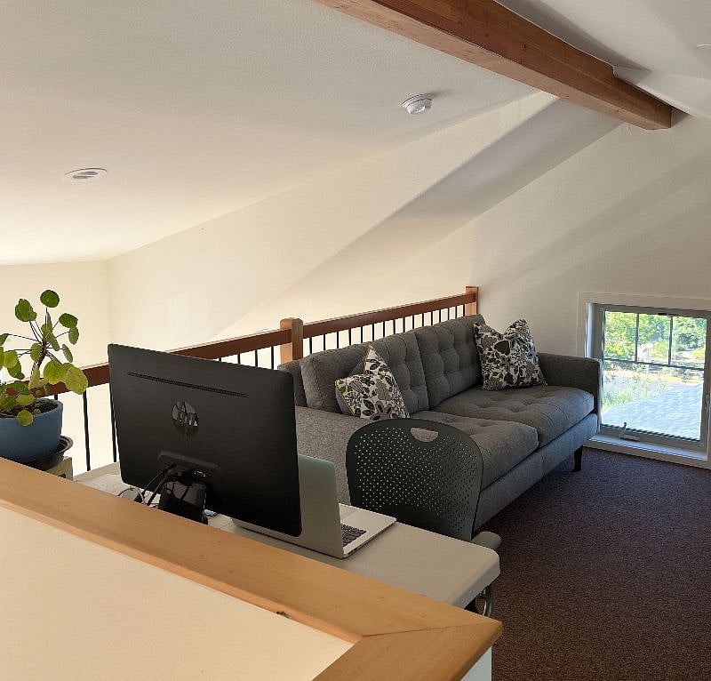 Sitting and work space in loft area