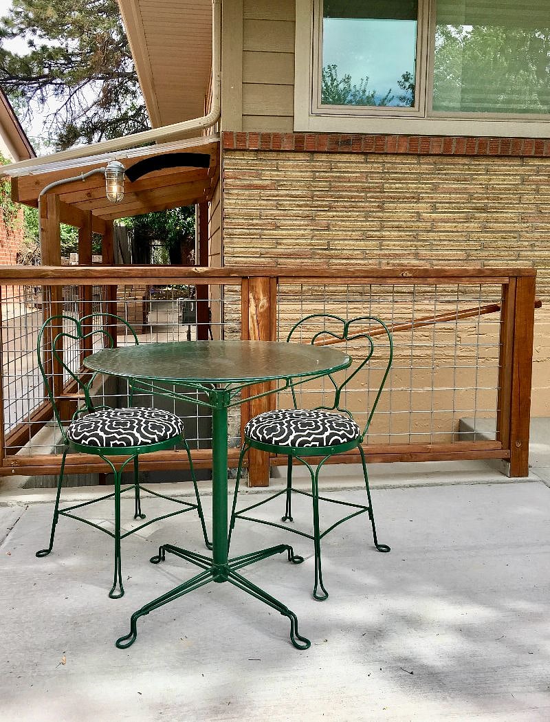 Private, outdoor sitting, eating area.