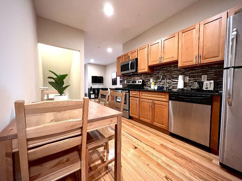 Shared Kitchen & Dining Room on Ground Level (there is one in each unit)