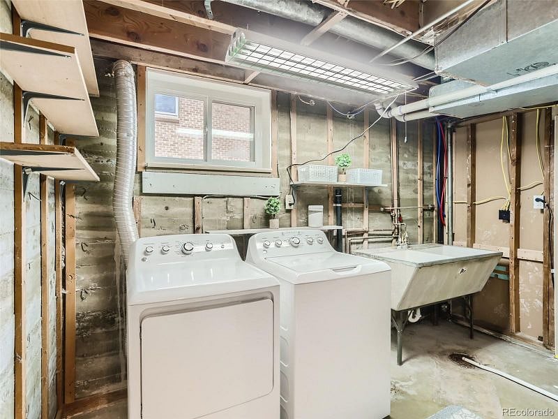 The laundry room is directly adjacent to the office/2nd bedroom. Please note that it is shared with us in the upstairs unit.