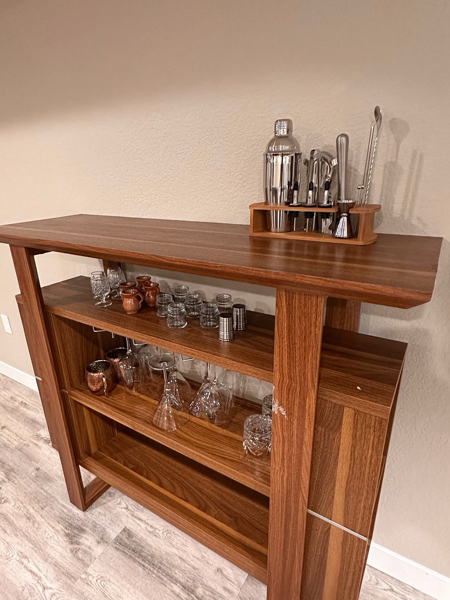 Bar furnishings include a drink shaker, stirring kits, straw kits, mixing rods, shot glasses, pouring spouts and various wine glasses, whiskey tumblers, and more!