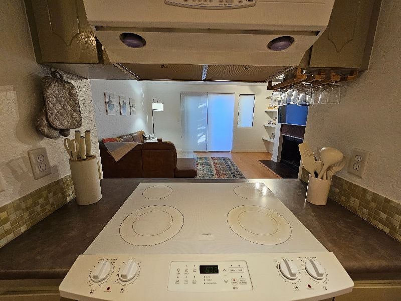 Flat cooktop and open floor plan makes cleanup and entertaining fun.