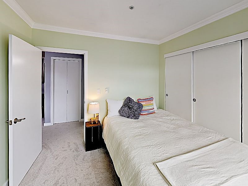 2nd bedroom with extra closet and then full bathroom with tub is to the right.
