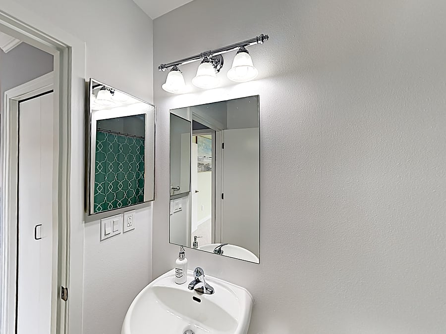 This is a 3/4 bathroom with a tub and shower.