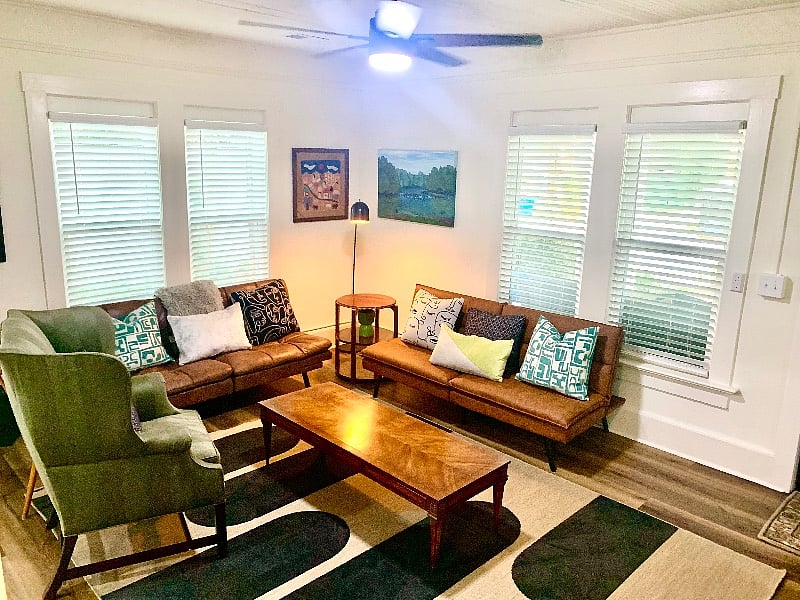 Large Living Room with 2 Sofas that fold down into Beds - All New Windows throughout the house.