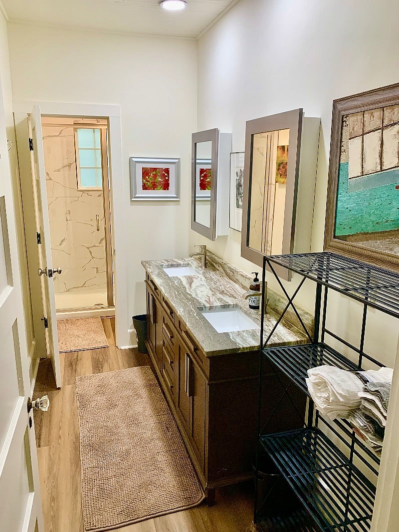Large Double Bowl Vanity with custom Leather Finish Granite Top.