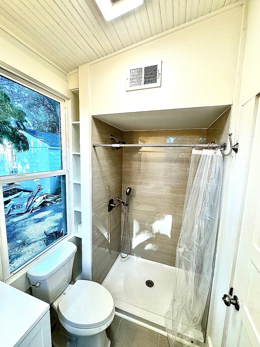 Second Private Bathroom making a Primary Suite with Bluetooth speaker in the Bathroom light/vent!