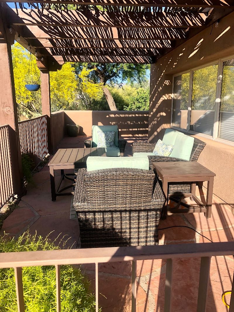 Comfortable outdoor furniture on the private porch.
