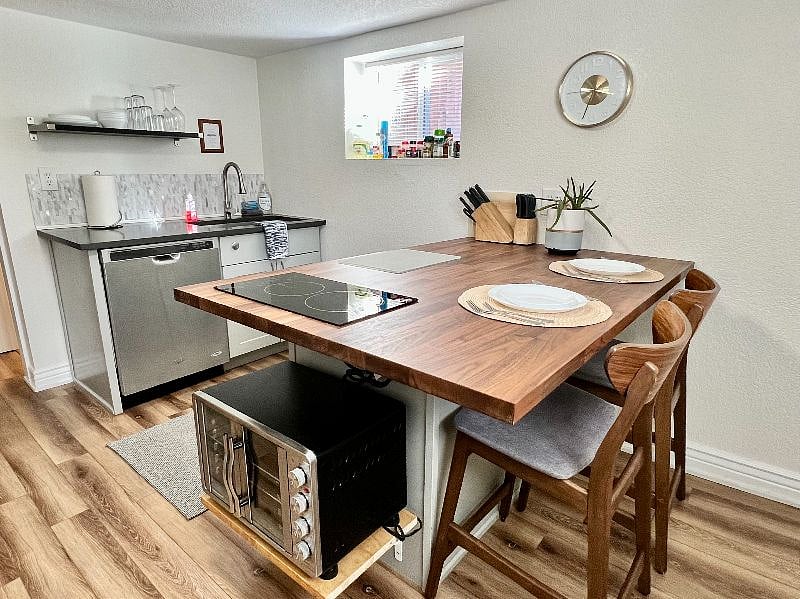 Fully stocked kitchen with seating for 2