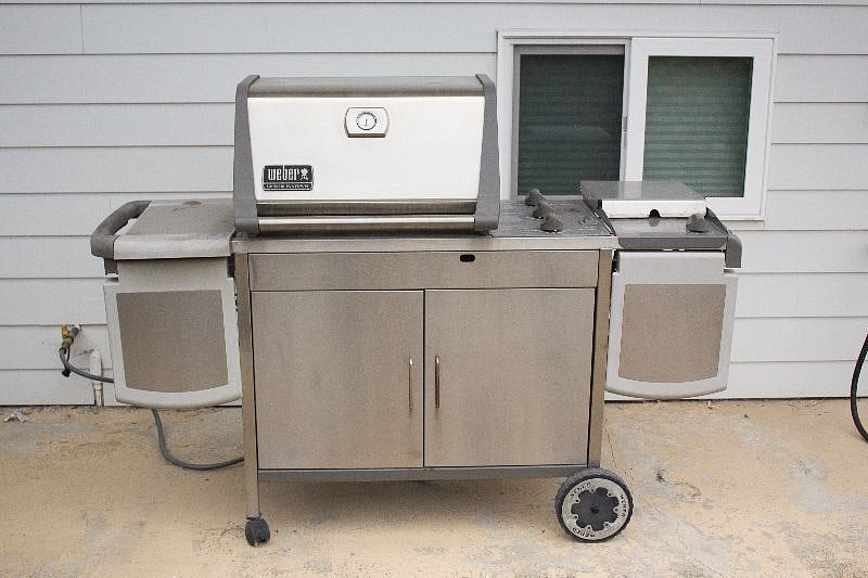 Gas barbecue located right outside your door.