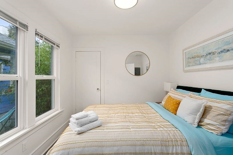 Bedroom 1. Queen bed with small closet