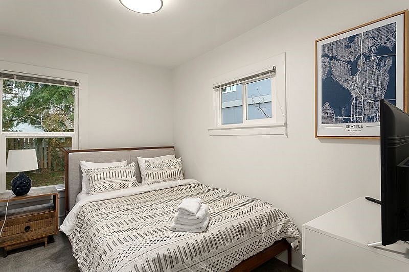 Bedroom 2. Queen bed. Small closet outside of the room