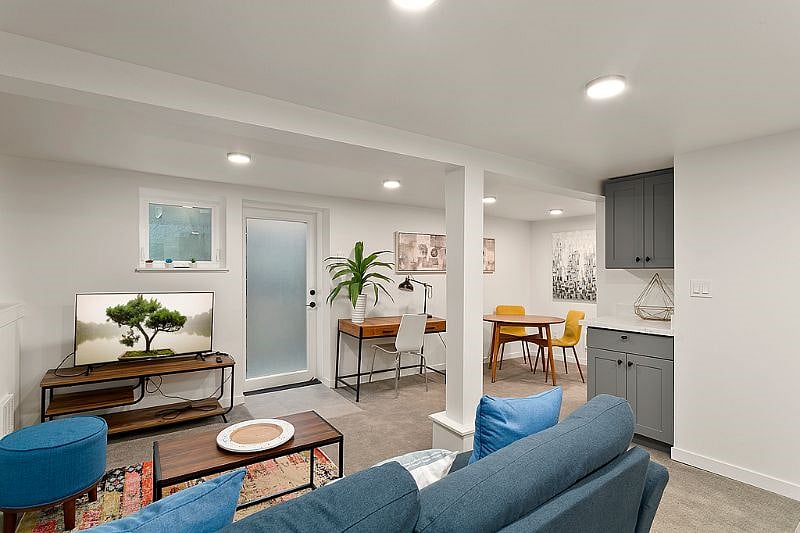 Downstairs living area. the downstairs bedroom has its own living room and kitchenette