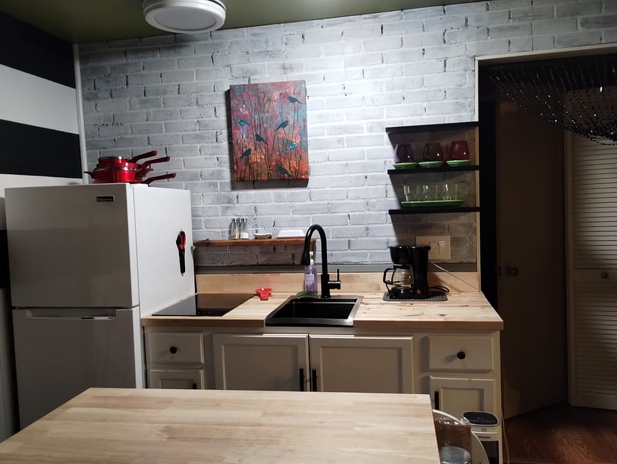 kitchenette with deep sink and 2 burners stove top