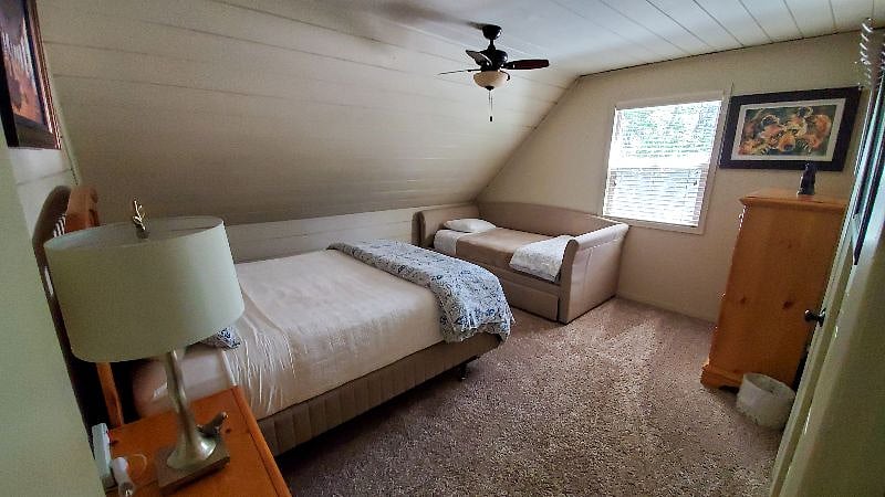 Bedroom #3
w/ queen bed and twin bed, dresser, closet, ceiling fan, 2 side tables, two lamps