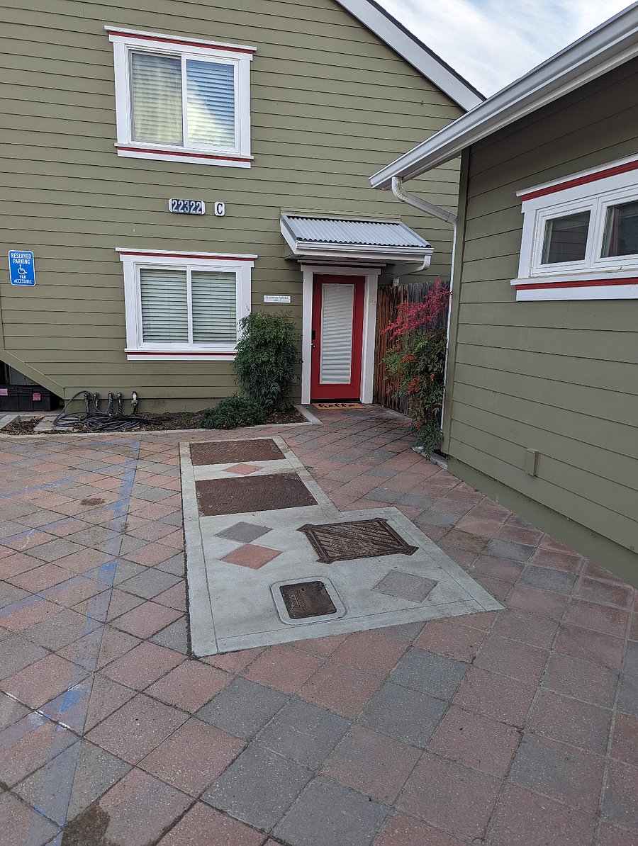 Front Door, plus parking spot right in front.