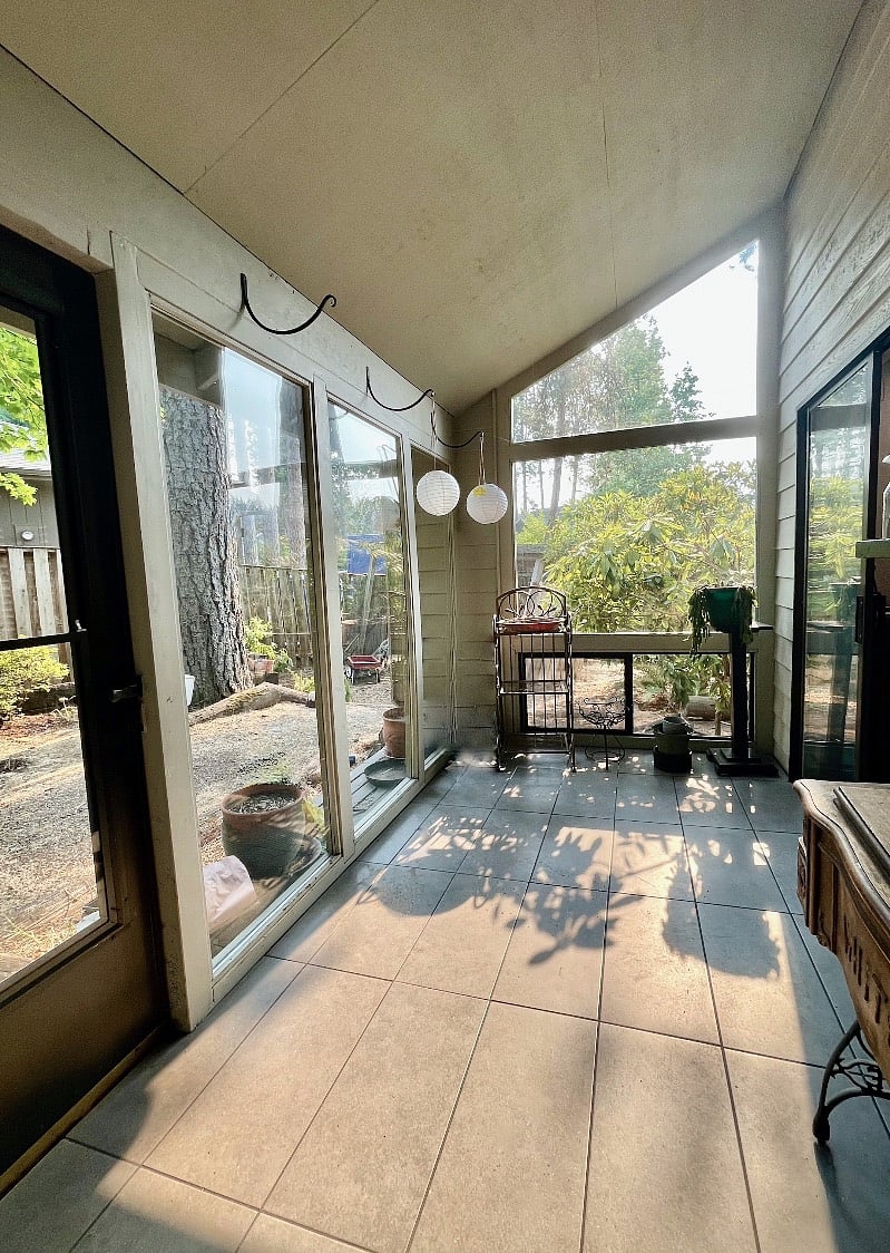 Large sunroom for your plants, or just to relax. Accessible from both the living and family rooms, and includes a door to the backyard.