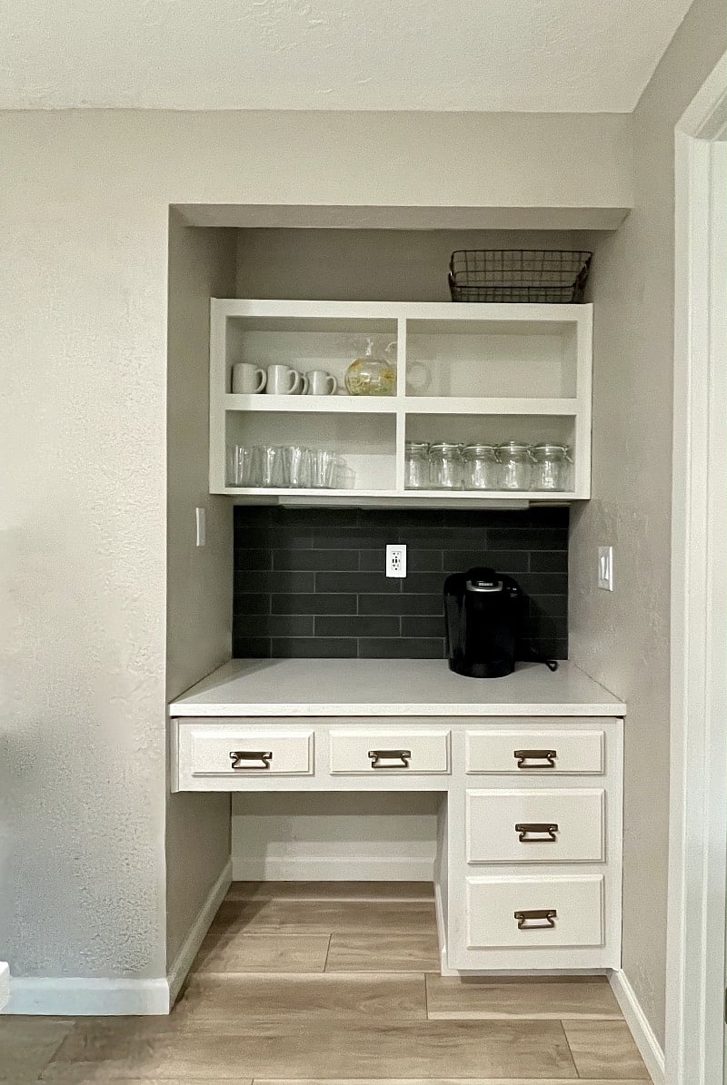 Coffee station in kitchen with ports for convenient charging of your devices, plus K-Cup coffee maker.