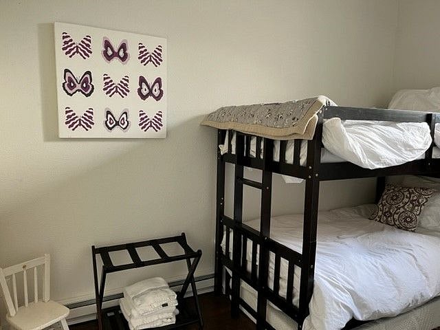 Bottom bunk can convert to a king size bed.