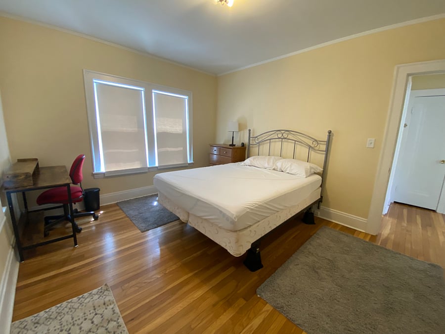 Master bedroom - queen bed, dresser & desk. 