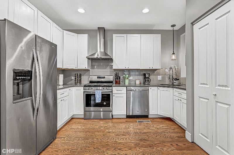 Gourmet kitchen is stocked with all the plates, glasses, silverware, pans and cooking basics you will need.