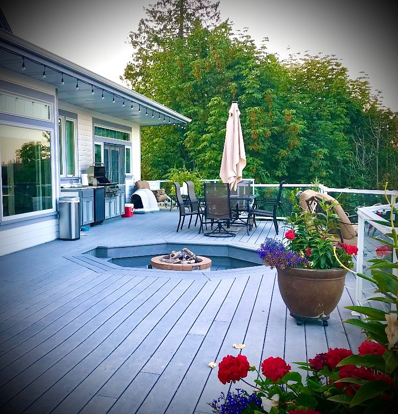 Our beautiful deck with table and cushy chairs to kick back on