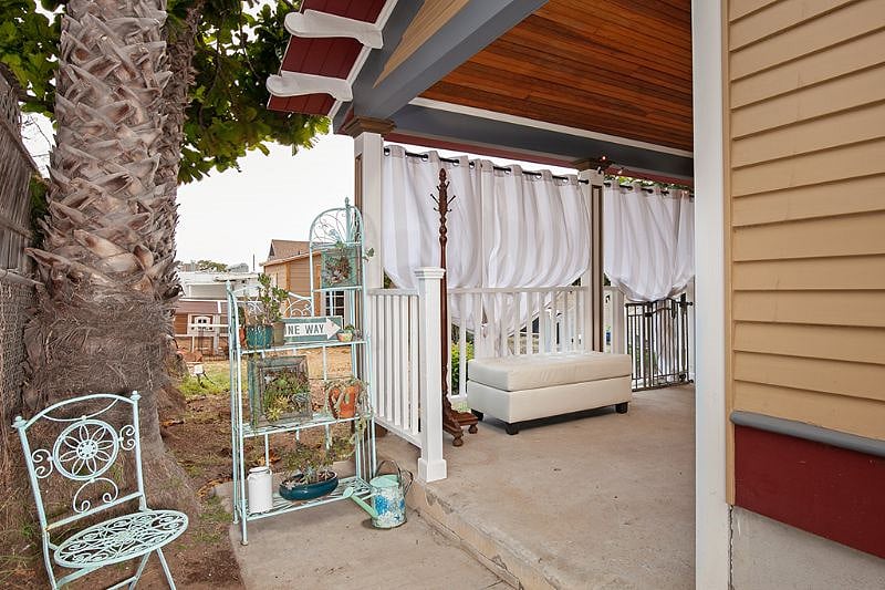 Stepping to the Right, you enter your private back patio with entrance to the unit.