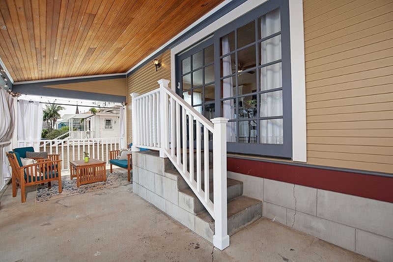 This is your private back patio, either curtained in or opened up to the garden and backyard.