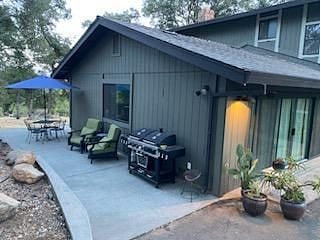 Furnished patio and BBQ area.