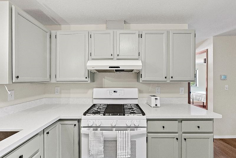 Full kitchen with new appliances and gas stove. Pots, pans, dishware and cutlery, bakeware