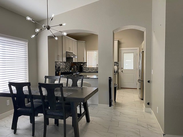 Dining Area; door in picture goes to backyard off Kitchen.