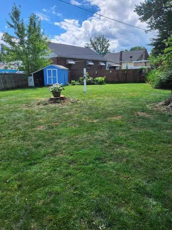 Fenced in backyard with doggy-door access.