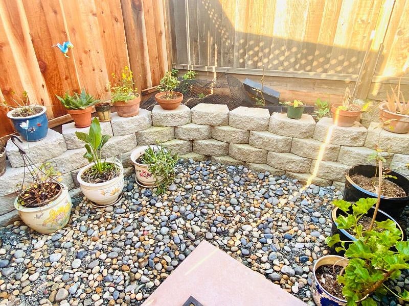 Some gardening area for herbs and vegetable garden. To be planted in summer. This is after you take steps down from the deck on the other side of entrance. Pictures with different angle available towards the end.