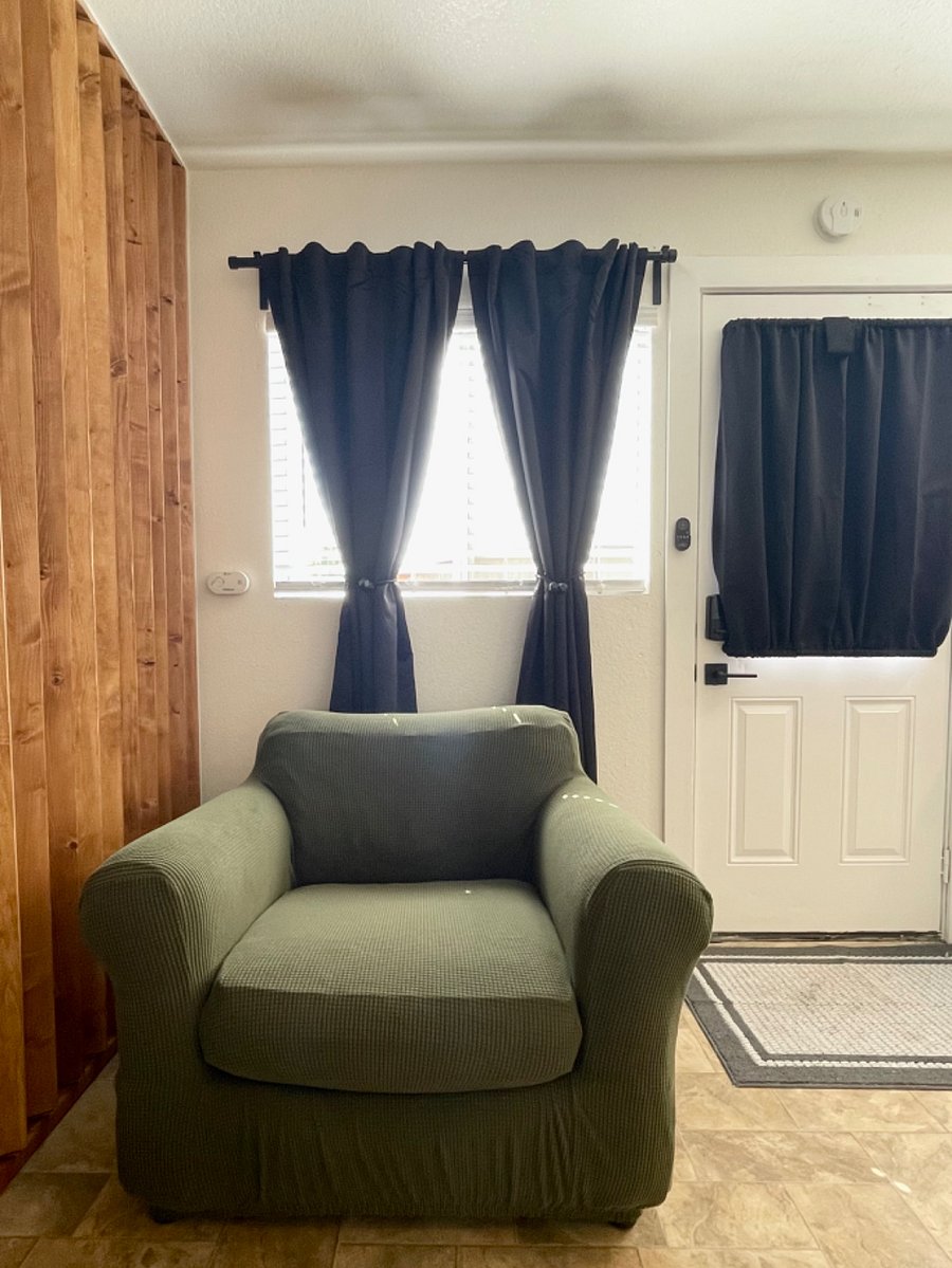 Blackout curtains and smart lock entry.