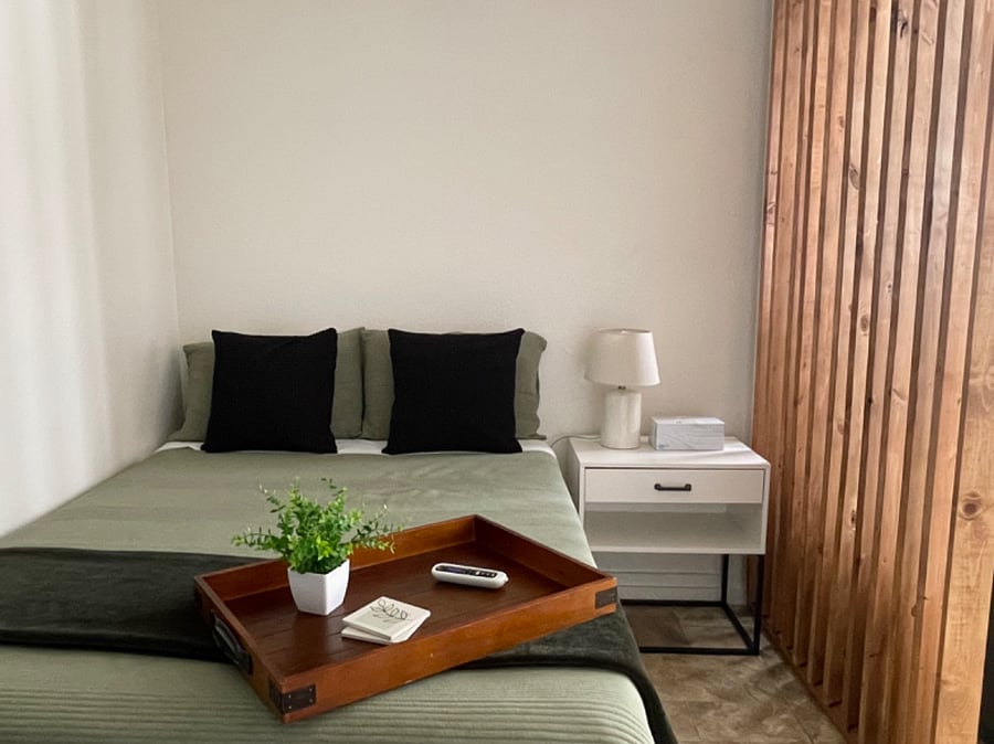 Louvered panels adjust to desired angle for additional privacy.