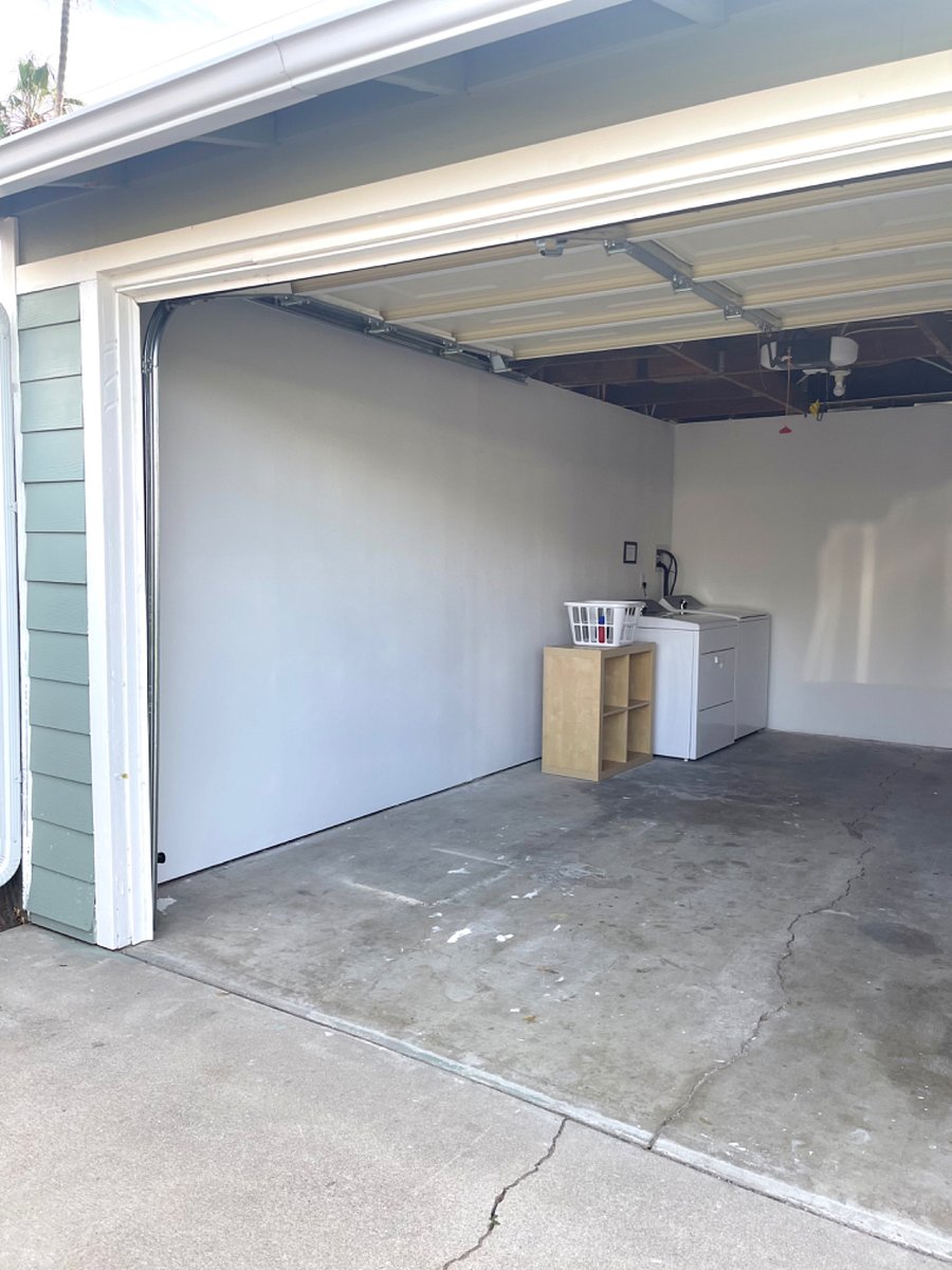 Private washer and dryer located in garage adjacent to studio.