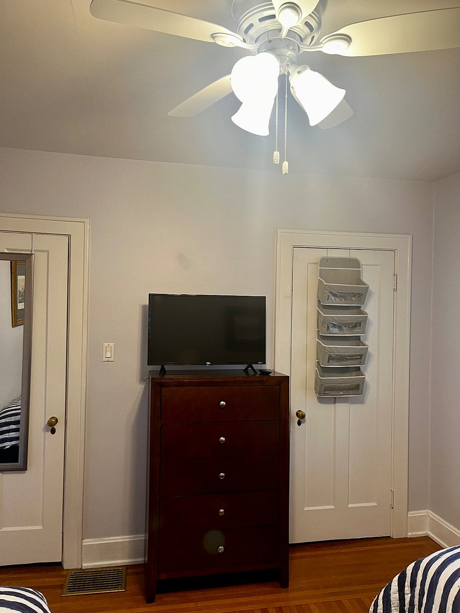 Smart TV, mirror on back of door, storage closet and dresser, etc.